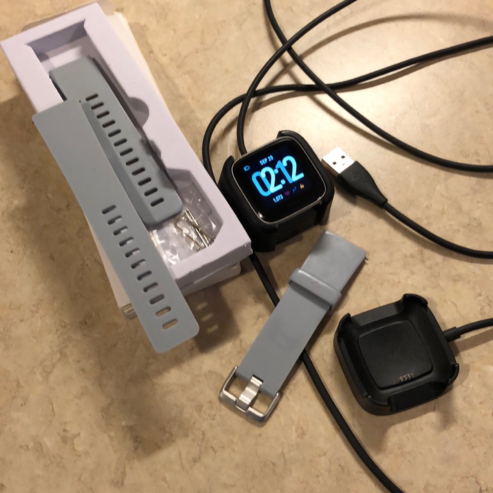 Fitbit Versa with accessories